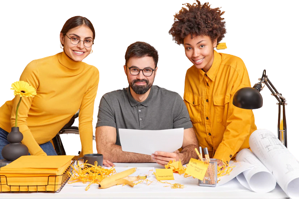 Content marketing team working on a project, smiling and collaborating