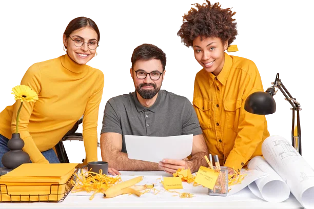 Content marketing team working on a project, smiling and collaborating